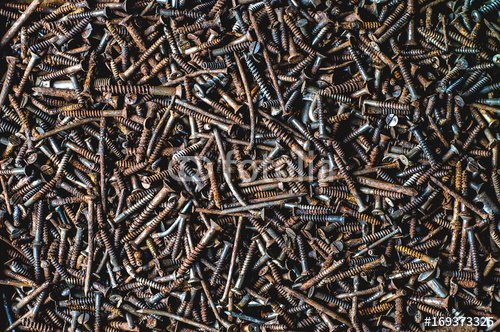 Background of old rusty screws. The concept of workshop or repair - 901150424
