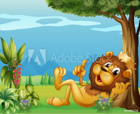 A king lion relaxing under a big tree - 901137808