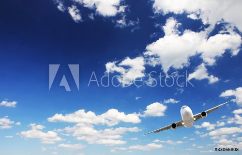 Airplane above sky - 900441674