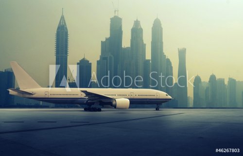 Airplane in front of a Skyline - 901137750