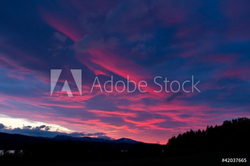 Beautiful Sunset over mountains - 900441672