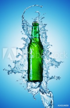 beer bottle being poured in a water