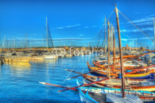 boats in Alghero harbor at sunset - 901145600