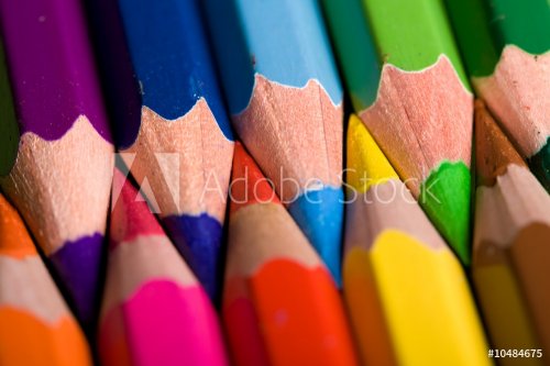 Close shot of a row of colored pencils - 900636538