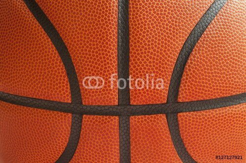 Close up shot of a basketball showing the seams - 901148399