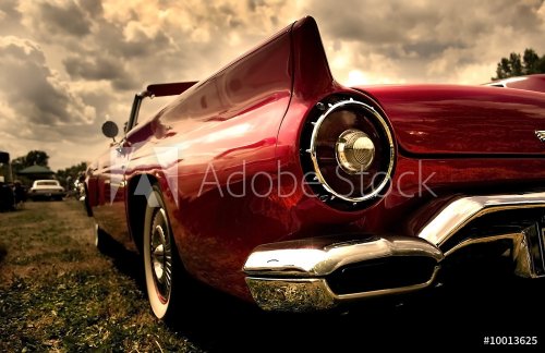 Close up shot of a vintage car in sepia color tone - 900464332