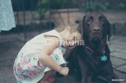 Cute girl with labrador