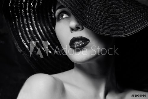 Mysterious woman in black hat