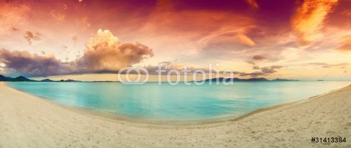 Panorama of tropical beach before sunset.