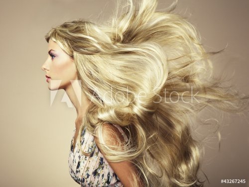 Photo of beautiful woman with magnificent hair - 900497411
