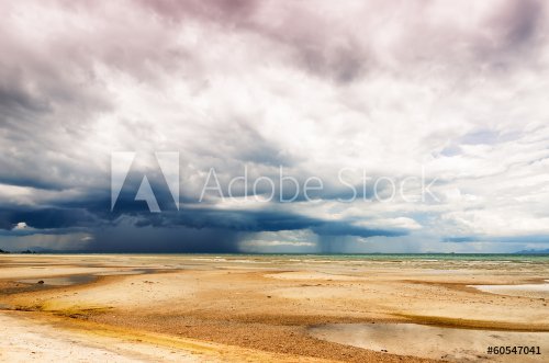 Stormy sky and beach at low tide - 901140982