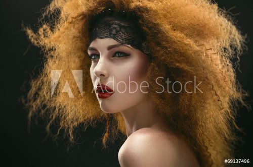 Studio portrait of passionate  redhaired woman