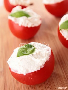 stuffed tomato with cheese and basil