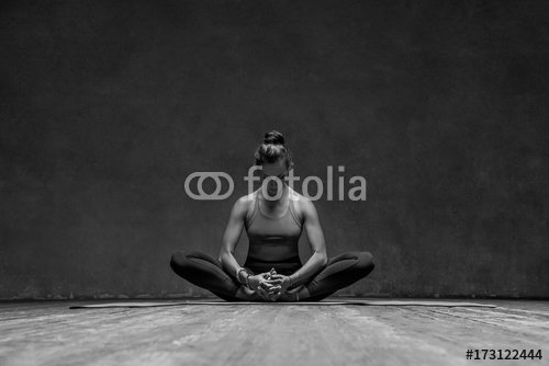 Young beautiful yoga female posing in studio - 901151119