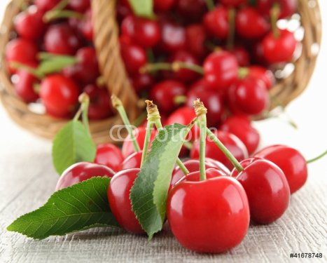 heap of cherries and leaf - 900623249