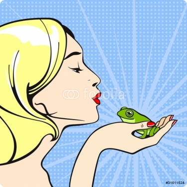 Young woman kissing a frog - 900469451