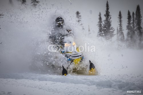 Snowmobile in winter mountain