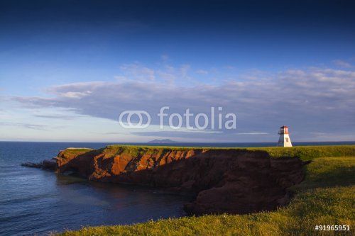 Lighthouse by the sea - 901154573