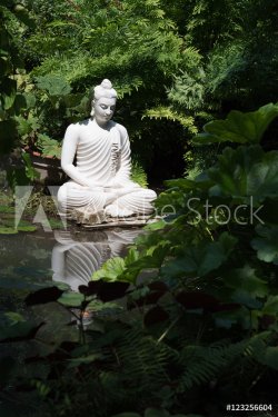 Meditating white marble sculpture reflected in water - portrait - 901154795
