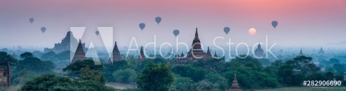 Bagan panorama with temples and hot air-ballons during sunrise - 901155182