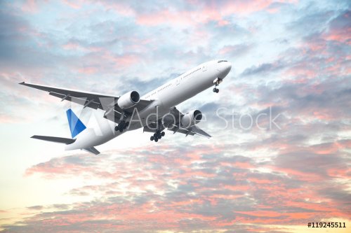 Aeroplane flying in sunset sky with beautiful cloud - 901155235