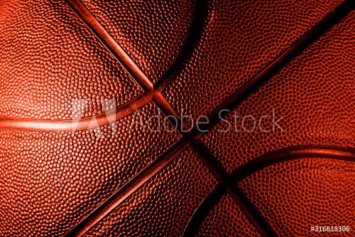 Closeup detail of basketball ball texture background. Lush Lava color Banner Art concept