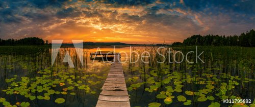 Panorama of beautiful sunrise over lake - 901155505