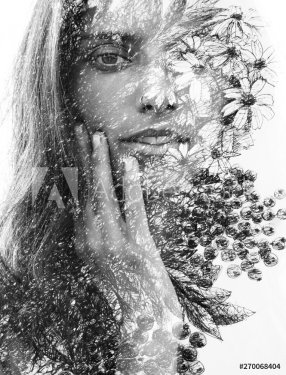Paintography. Double Exposure portrait of a beautiful young woman gently touching her face combined with hand drawn painting with floral motifs. black and white