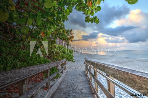 Boardwalk entering North Gulf Shore Beach in Naples Florida at Sunrise
