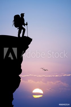 hiker at sunset - 901155986