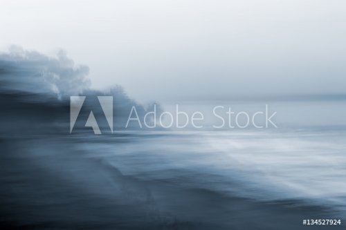 Motion Blurred Seascape. A monotone, blurred seascape made using a long expos... - 901155994