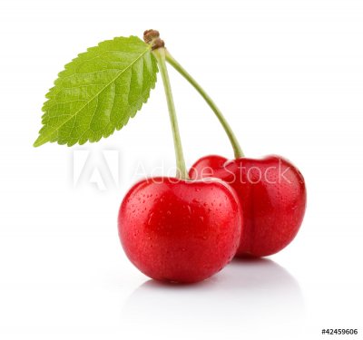 Ripe cherry berries with green leaf isolated on white