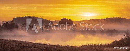 Misty, multicolored sunrise over Lake in Poland - 901156164