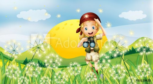 A girl holding a telescope near the grass - 901137814