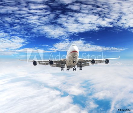 Airplane above clouds - 901146775