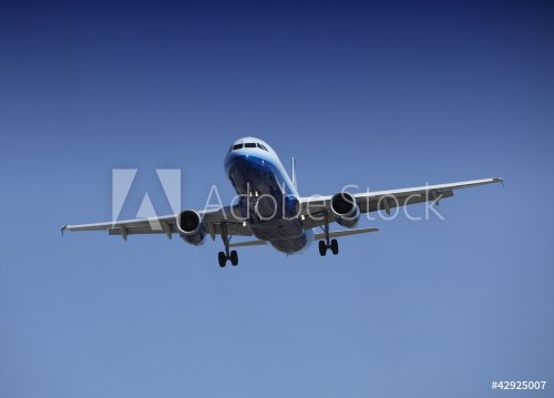 Airplane approaching for Touchdown at Los Angeles Airport - 900706025