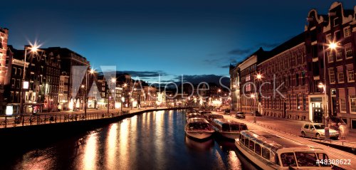 Amsterdam channels at night - 901139836