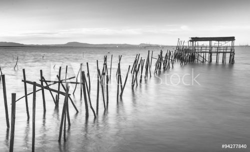 Ancient pier at black and white - 901153383