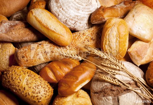 assortment of baked bread with wheat - 901152448