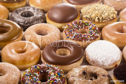Background of Assorted Donuts (Doughnuts) of Various Flavors - 901152460
