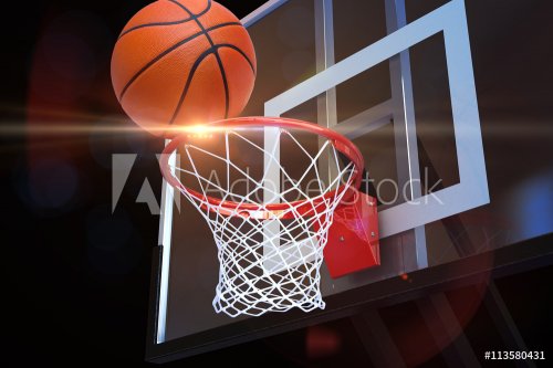 Basketball heading to the net at a sports arena with lens flare . Sports, fitness , competition team concept. 3d rendering
