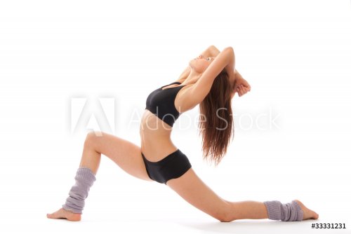 Beautiful slim fitness woman stretching exercise - 900739861