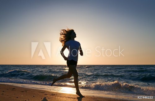 beauty woman run on sea beach - 900723660