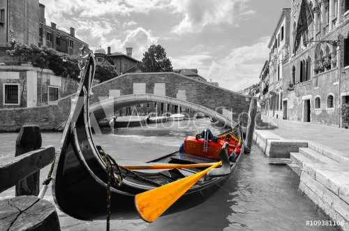 Black and white of a beautiful canal in Venice with selective color on the go... - 901153044