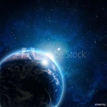 blue earth in space with rising sun