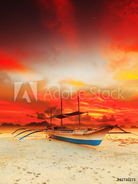 Boat at sunset - 900452693