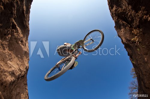 boy going airborne with a dirt  bike - 901144488