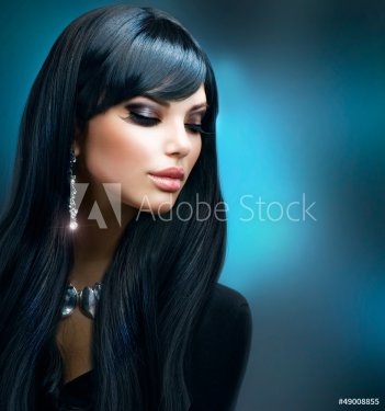 Brunette Girl. Healthy Long Hair and Holiday Makeup