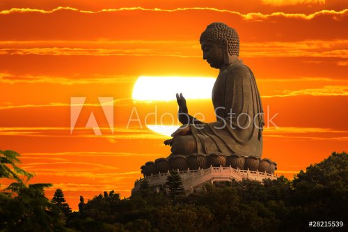 Buddha statue at sunset - 900021653