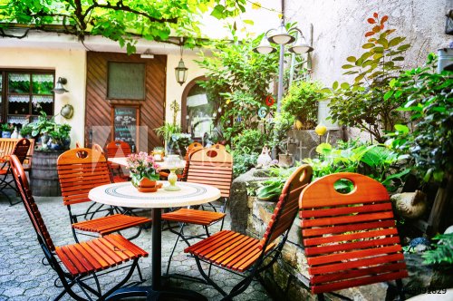 Cafe terrace in small European city - 901146532